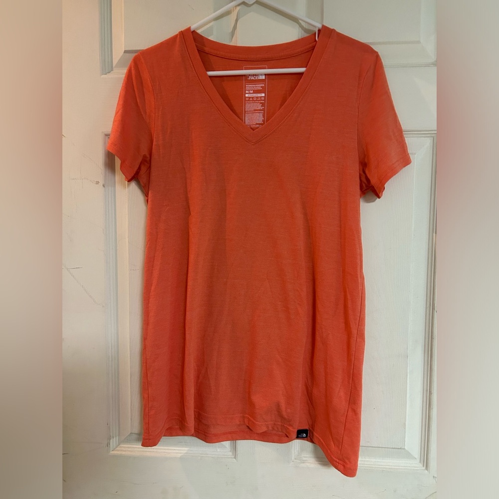The North Face Orange Tee Shirt Basic Medium. Short Sleeve.  V neck.